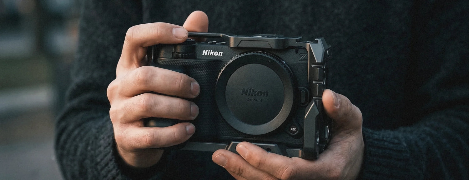 Hand holding the 8Sinn CNZR camera cage for the Nikon ZR